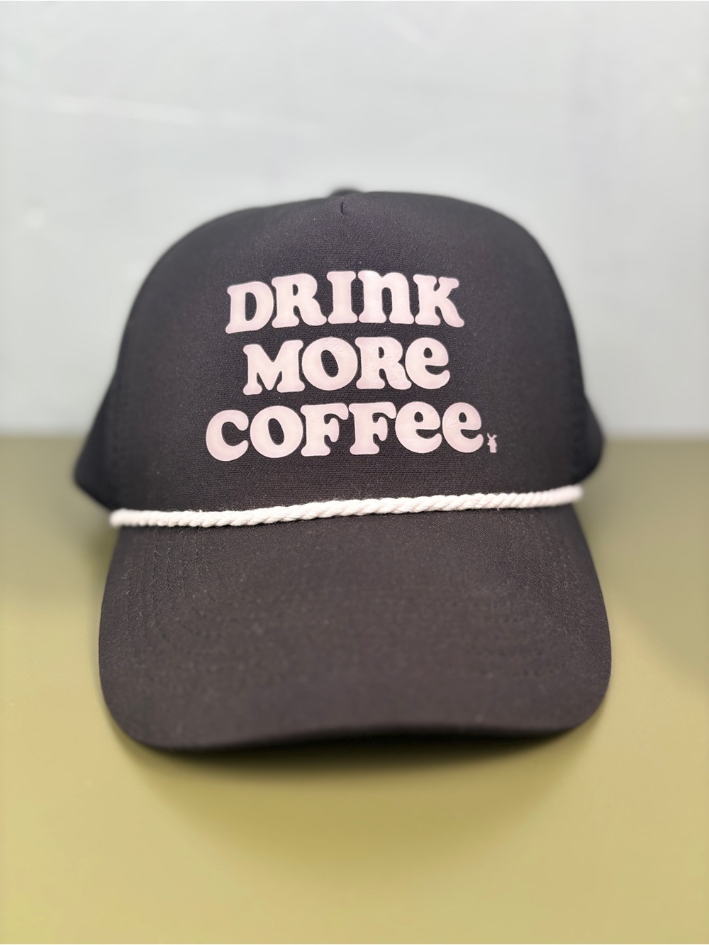 Dutch Bros Black Trucker Cap with White "Drink More Coffee" Text